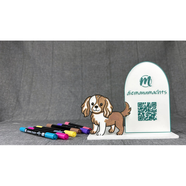 Hund mit Flecken (Cavalier-Stil)